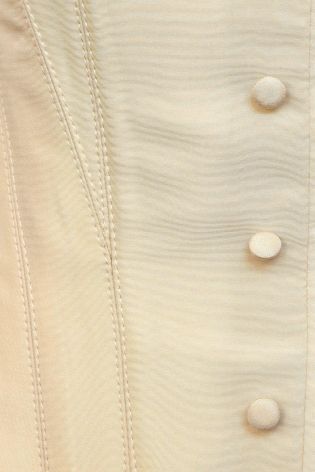 Корсет на пуговицах и юбка с отворотом